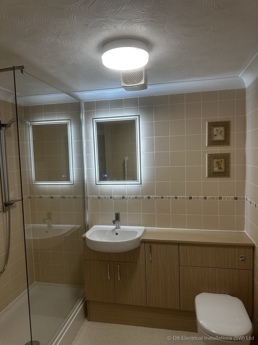 Bathroom LED mirror and zone-rated lighting installed by DS Electrical