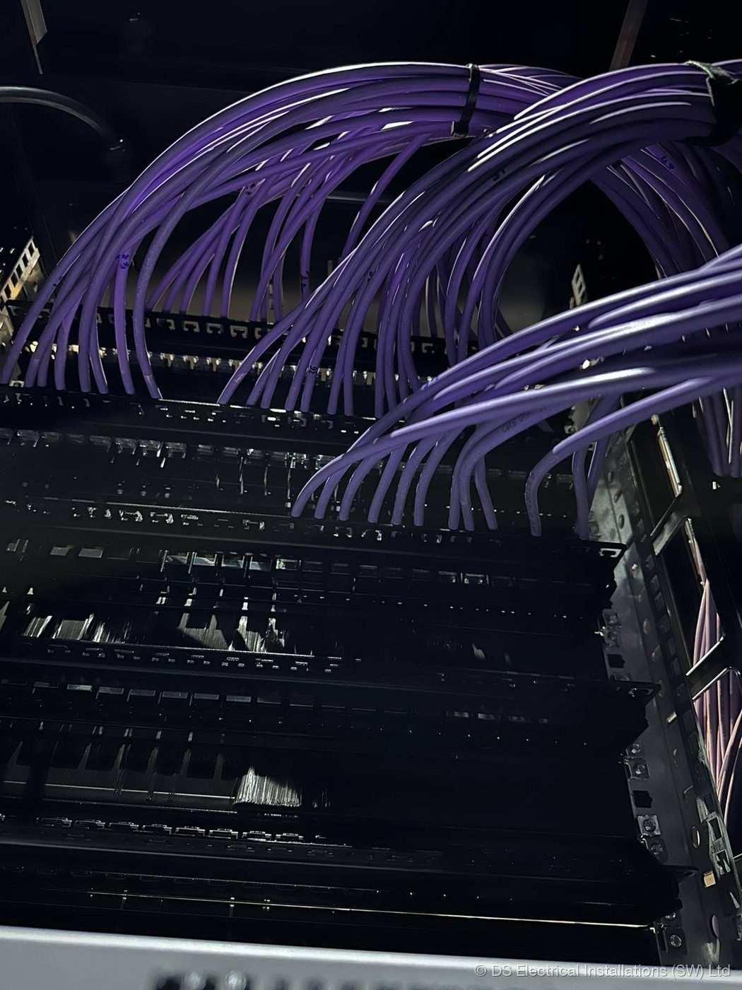 Network rack with colour-coded structured data cabling by DS Electrical