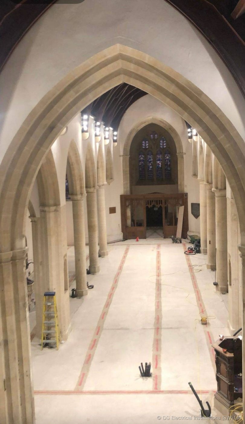 Heritage church nave lit by a discreet lighting installation from DS Electrical