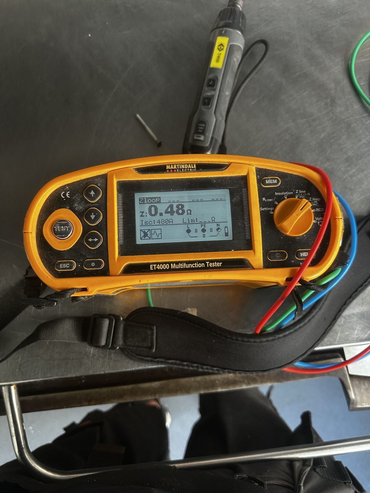 Multifunction electrical test instrument used during an EICR inspection
