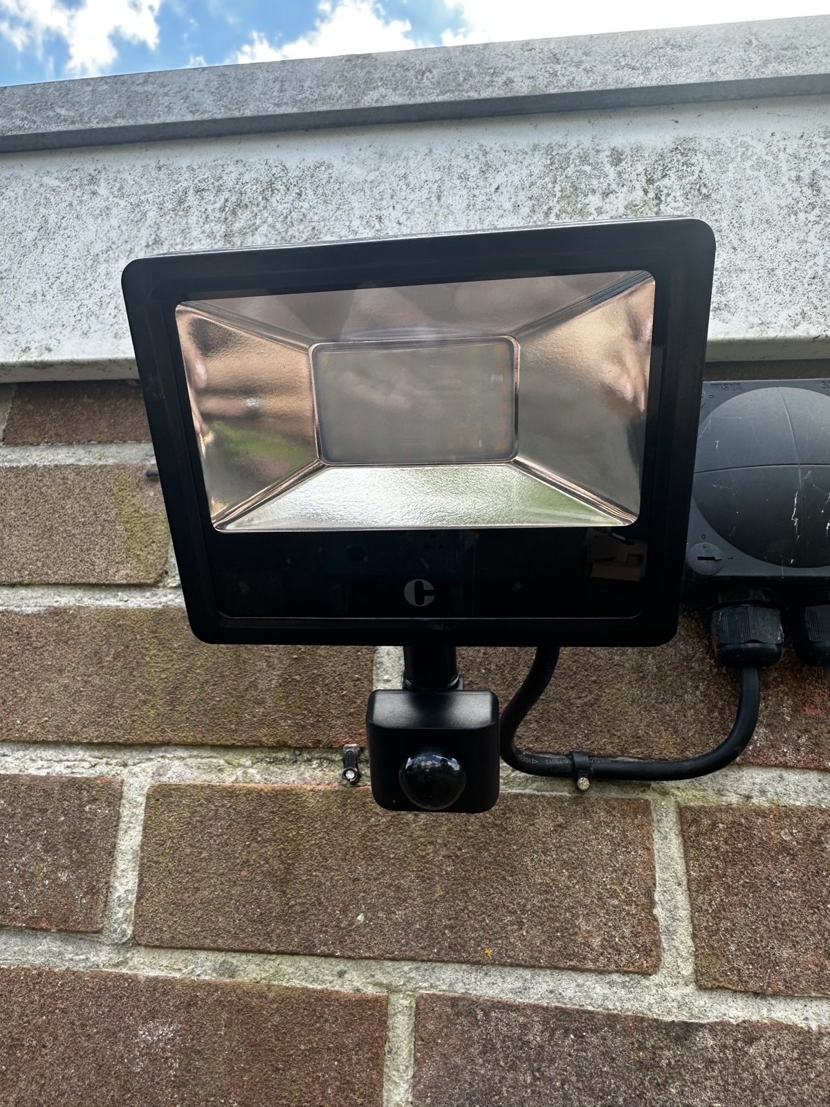 Real DS Electrical garden install &mdash; PIR floodlight on a Mid Somerset property
