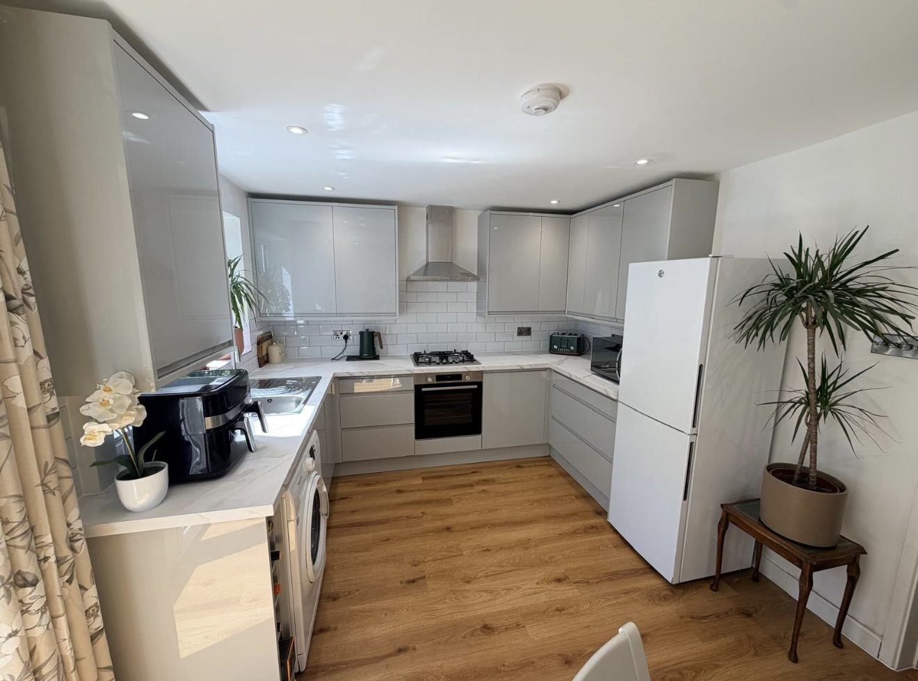 Shepton Mallet kitchen with recessed LED downlights, cooker circuit and mains-linked smoke alarm by DS Electrical