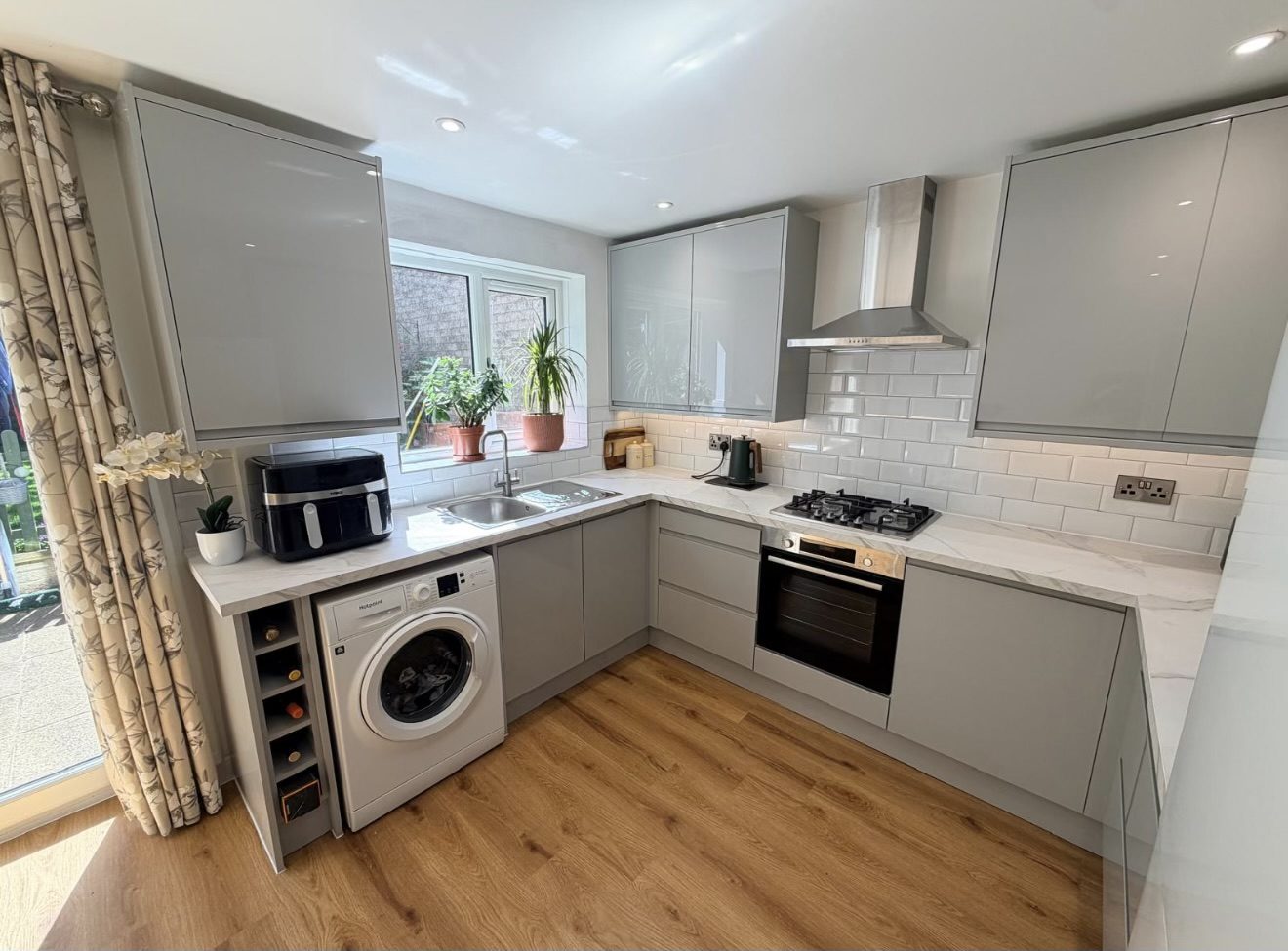 Under-cabinet LED lighting and appliance circuits over the worktop in a Shepton Mallet kitchen by DS Electrical