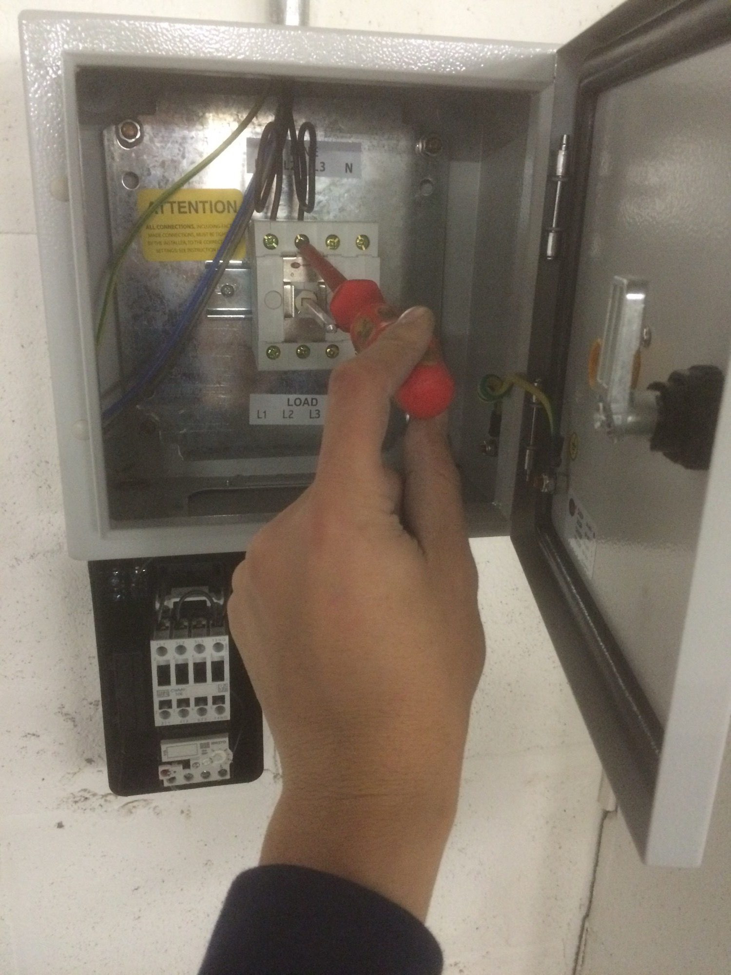 Three-phase isolator switch installed at a commercial premises