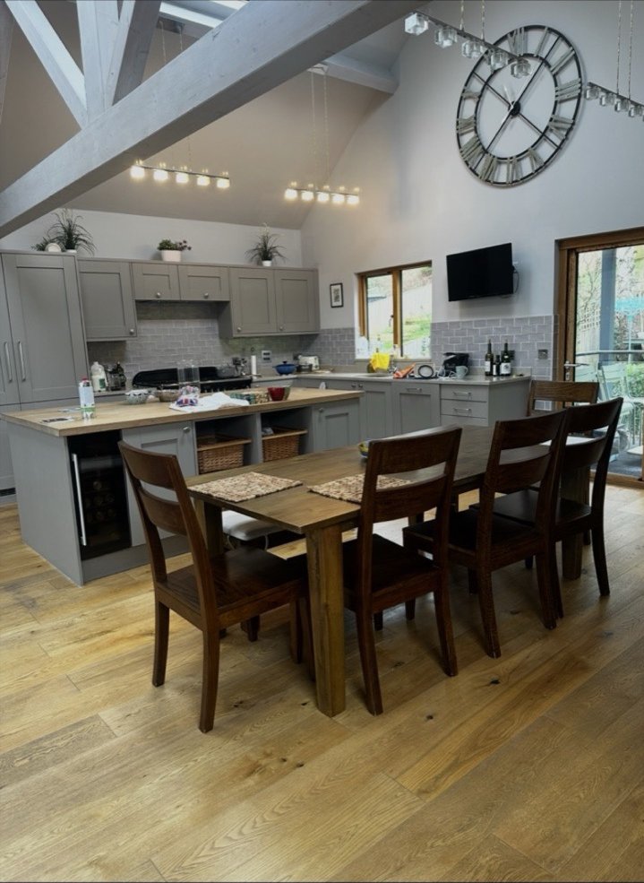 Vaulted ceiling kitchen with LED track lighting
