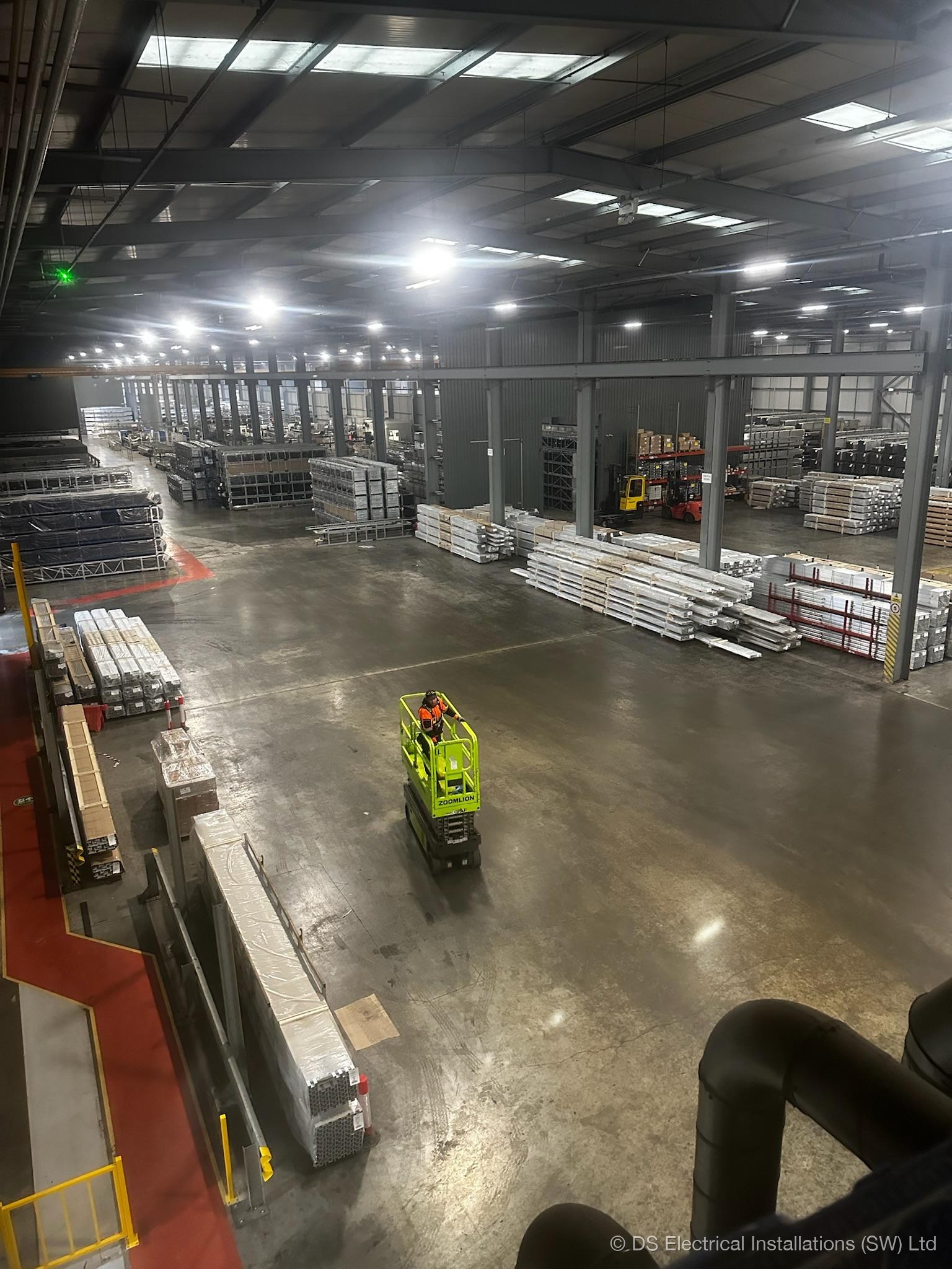 Large commercial warehouse interior, scale of network infrastructure work by DS Electrical